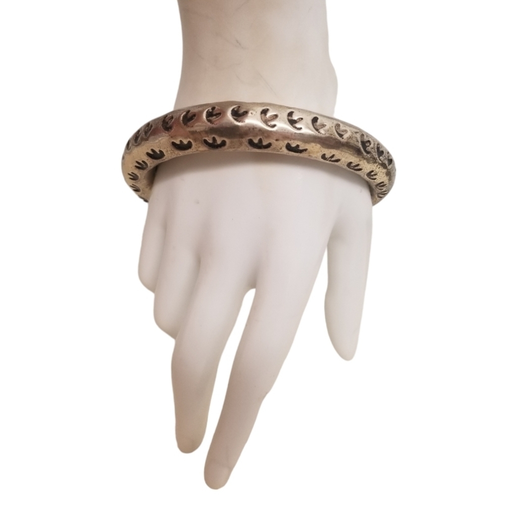 VINTAGE NICKEL SILVER WESTERN STYLE  BRACELET WITH EMBOSSED DESIGNS
